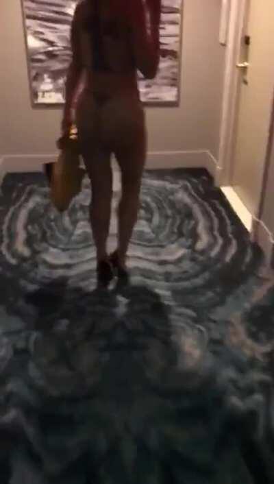 Busty Blonde Removes Dress In Hotel Hallway