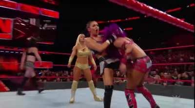 Mandy Rose and Sonya Deville beating up Sasha Banks