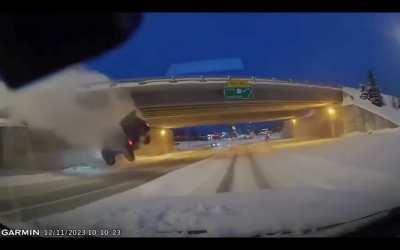 Author/cammer hits a car that fell of a bridge. 