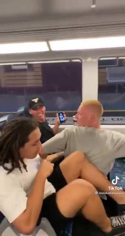 Watch the knee of the guy on the left