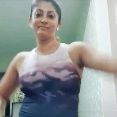 Homely desi girl showing her sweaty darkish fleshy armpits while dancing. Do you like it?