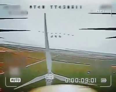 Russia attacking a wind turbine in Mykolaiv with a fpv drone.