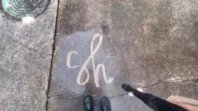 Very impressive power washing penmanship