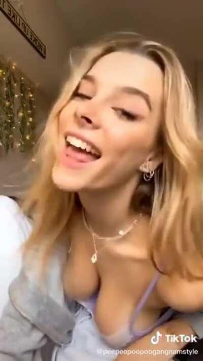 Music is annoying, but her tits sure are nice!