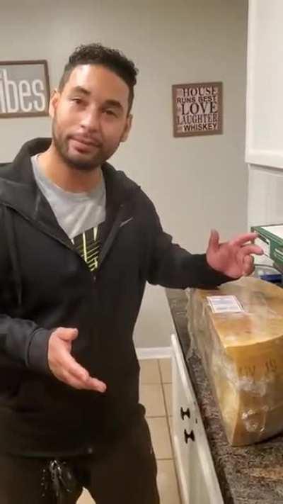 Staff member prices 1/2 Parmesan wheel at $10.44 total instead of $10.44 per pound