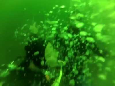 Scuba diver having a panic attack