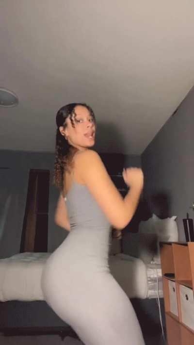 Ana poking out in her dress