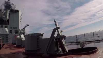 Russian cruiser Varyag launching two S-300F surface-to-air missiles
