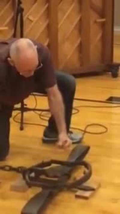 Old Man Thinks He Can Punch A Bear Trap Without Getting Caught and Proves It