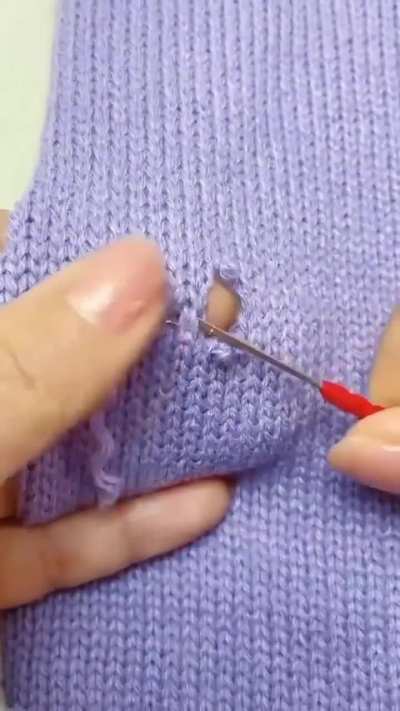 This repair of a hole in the knitting