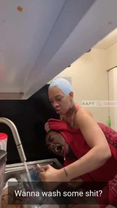 Never mess with a mom washing dishes