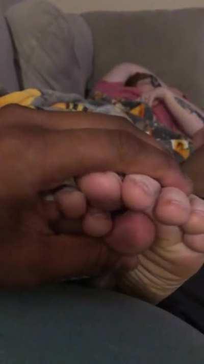 wife’s feet watching tv