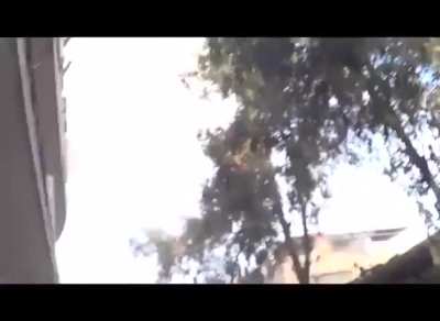 Incoming Syrian Army shelling sends serious debris raining down on a gathering of FSA fighters - Aleppo - 10/4/2012