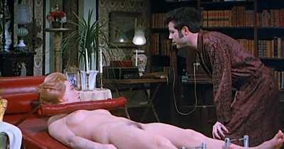 Sue Longhurst restrained on trick couch - 