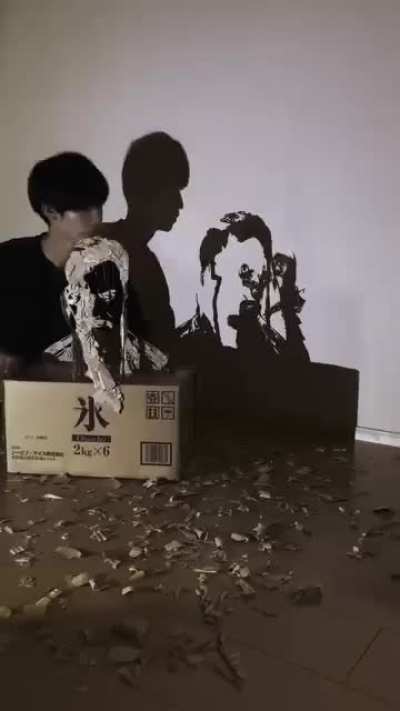 Kuronoshi uses meticulously cut and layered cardboard, combined with precise lighting, to create intricate, detailed silhouettes of famous figures and scenes