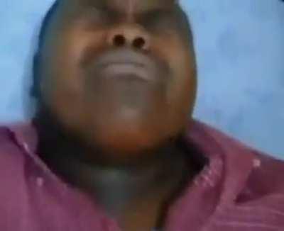 WCGW playing with a tiny instrument while laying down