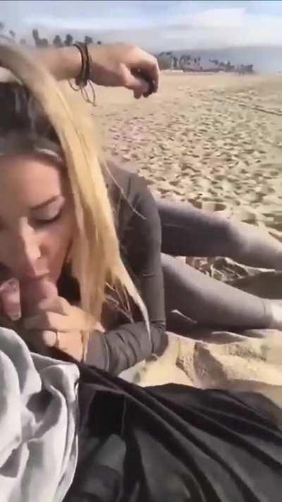 Blowjob On The Beach