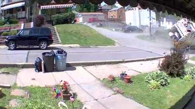 So this happened on my street yesterday. Somehow no one was hurt.