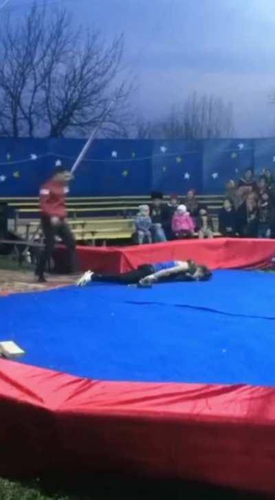 Snake handler get his neck crushed in front of his audience while performing