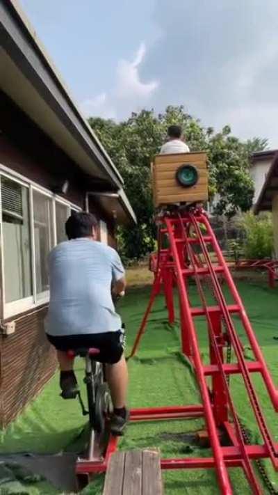 A bicycle powered mini roller-coaster.