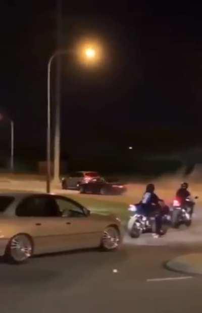 Drag racing in front of a cop