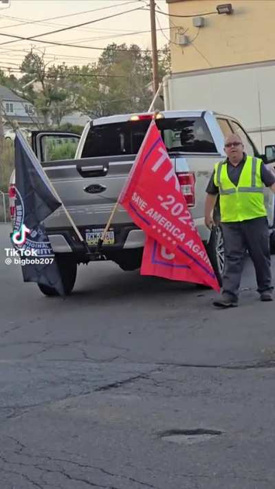 Guy with Trump flag on truck calls out person filming them asking if they are 