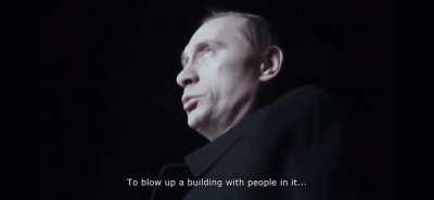 Vladimir Putin visiting a bomb site in 2000.