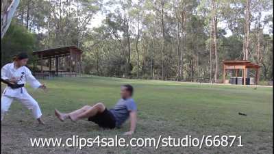 Karate and Trample by a third dan black belt in a public park - full clip available in store with more top quality content made by real martial artists.