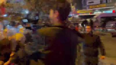 Riot police gets pushed by the protesters at the Turkish capital