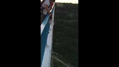 Base jumper forgets to strap on his parachute - 