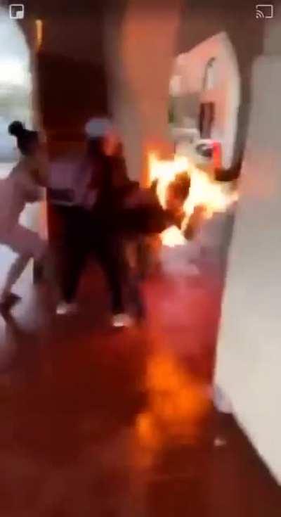 Guy's on fire trying to start fire