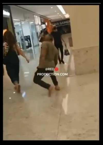 Guy shopping with his wife