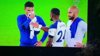 Thiago Silva rubbing his nose with Lucas Moura Spurs Jersey