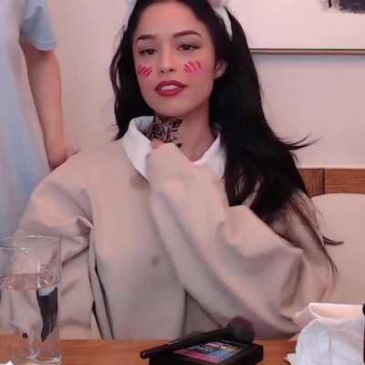 Rae gets a neck tattoo