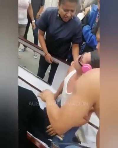 Dead man is taken out of his coffin and taken away by motorcycle