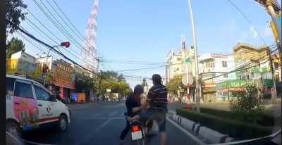 Car driver gets revenge on a stupid rider