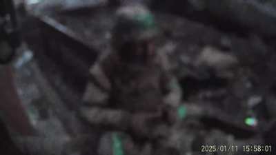 GoPro of Ukraine's KORD special police force, covered by the heavy machine gun of an armored vehicle, dismount and fire Bullspike-AT grenade launchers at Russian-occupied building during urban fighting in Toretsk, Donetsk. [11.01.2025]