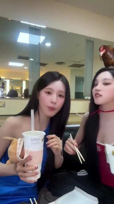 Yuqi with Miyeon (Having fun with chicken hat <3)
