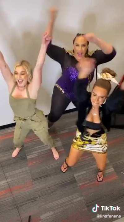 Renee young, nia jax, and lana dancing