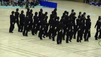 Japanese high school students demonstrating precision walking