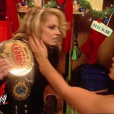 Mickie kisses Trish