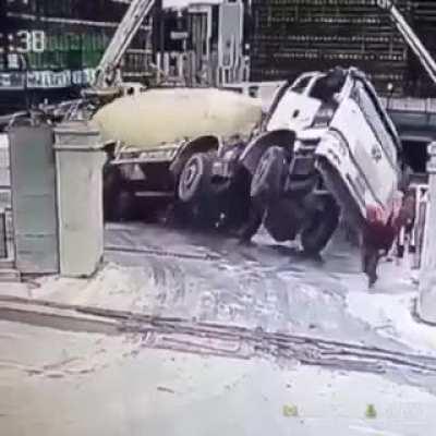 Backing up a cement truck at a construction site