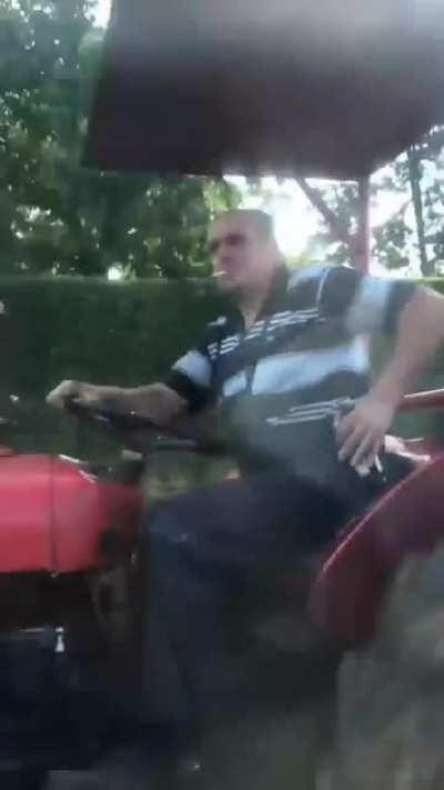 Just some dudes offering a cold one to a farmer on a hot day