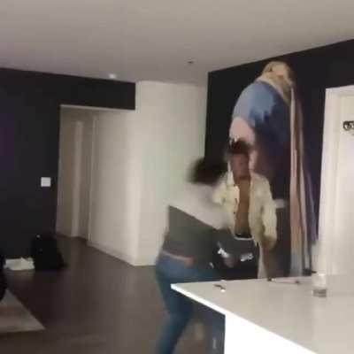 Juice playing basketball with his mom.