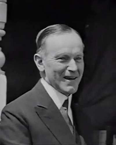 Coolidge smiling