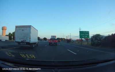 Boxtruck driver on his phone