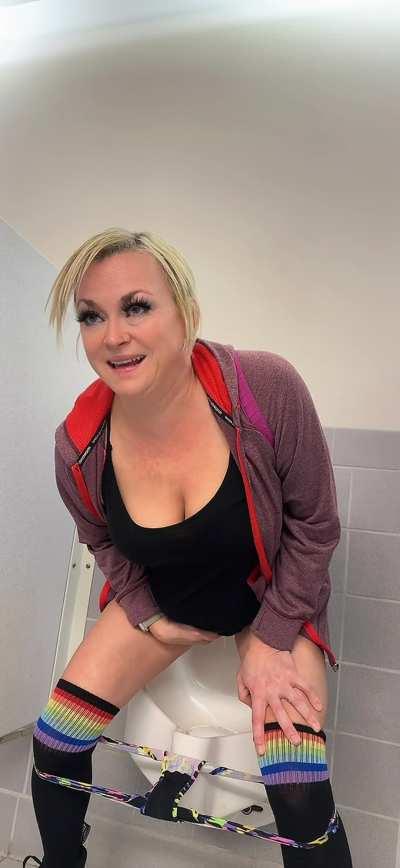 Peeing in the men's urinal