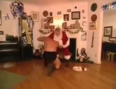 Goldberg beats up Santa Clause.