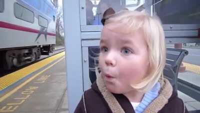 A little girl seeing a train for the first time!