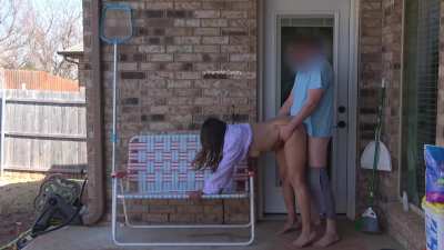 While everyone in the house is watching TV, she is jumping on it outside!